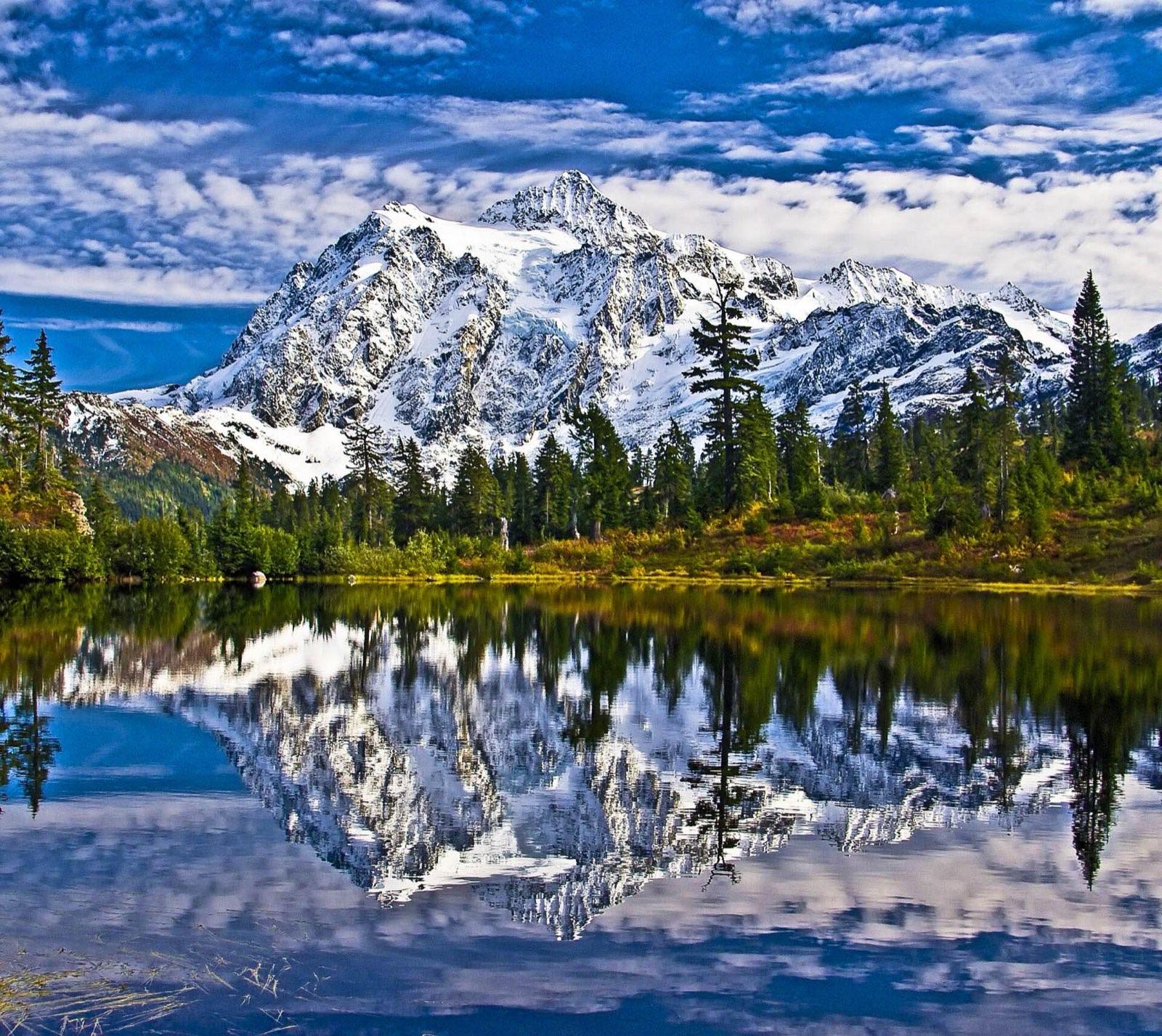Mount Shuksan reflected in Picture Lake amid autumn color, Washington