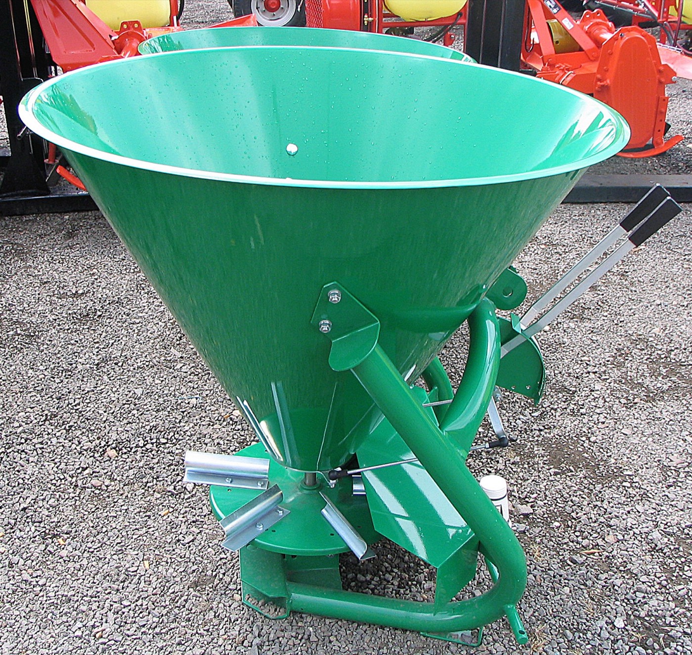 Broadcast spreader used for lawn fertilizer and seed