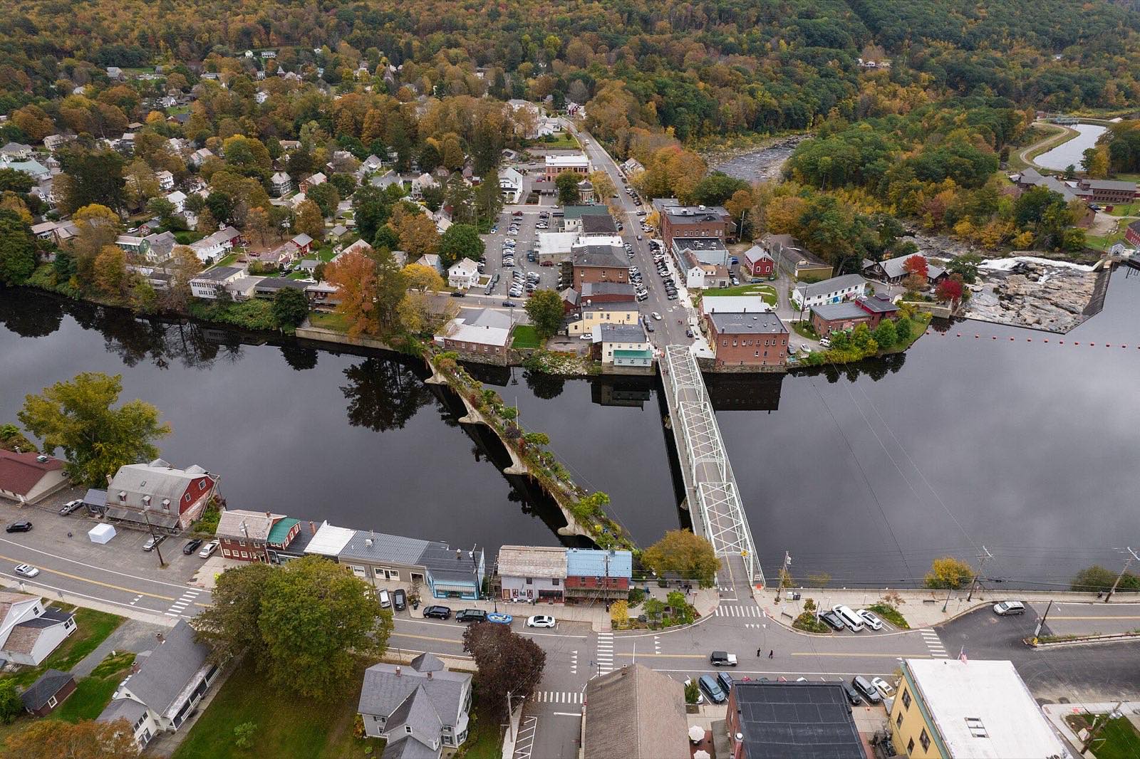 Aerial view of Shelburne Falls and the Deerfield River in autumn